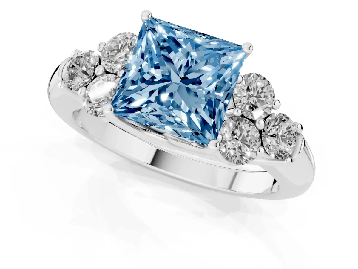 Fancy Blue Princess Cut Cut Diamond Cluster Ring with Round Accent Stones and Prong Setting on a Classic Band Silver