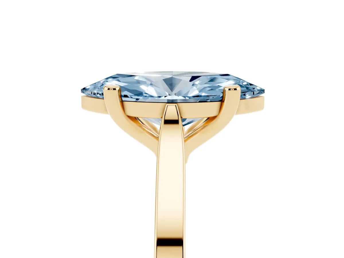 Fancy Blue Marquise Cut Solitaire Diamond Ring with Four-Prong Setting and Tapered Band Yellow gold
