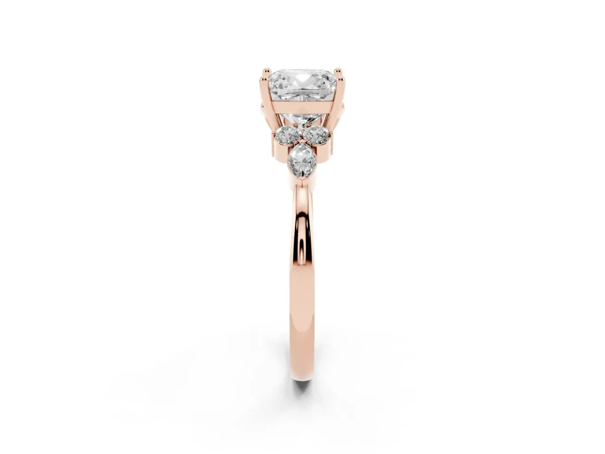 Cushion Cut Brilliant Diamond Solitaire Ring with Pear Side Stones and Four-Prong Setting Rose gold