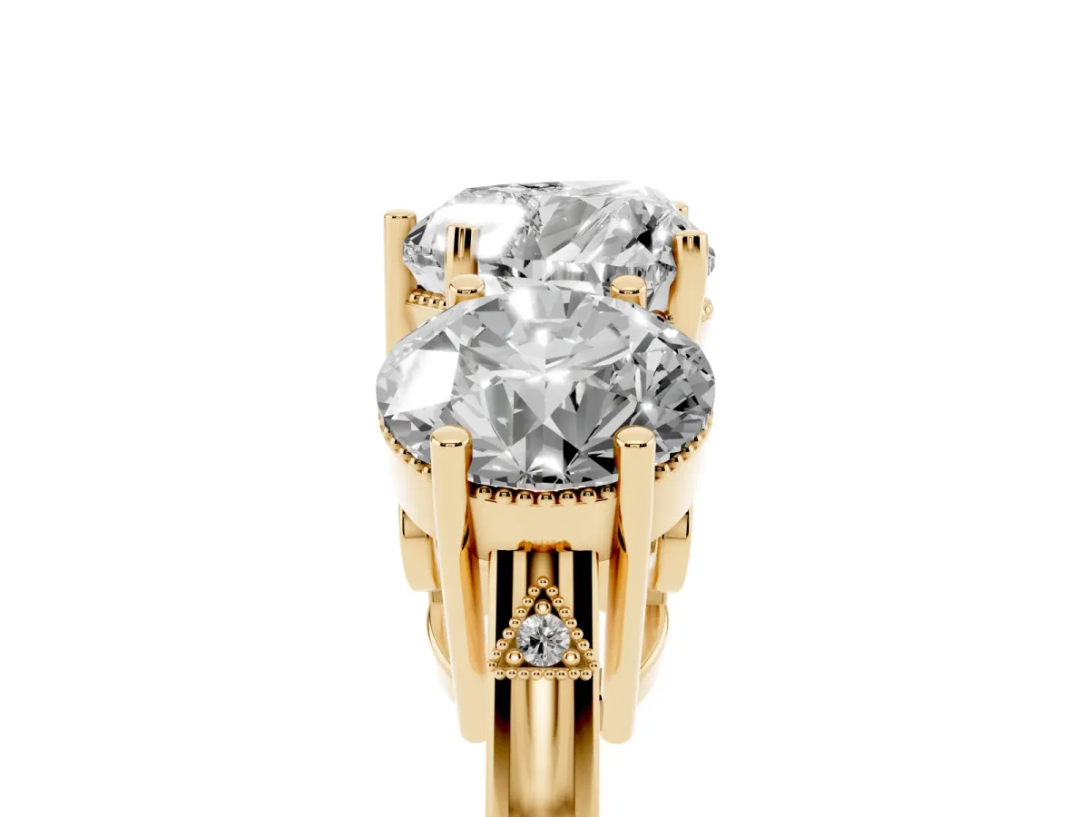 Three-Stone Heart Cut Diamond Engagement Ring with Prong Setting on a Classic Band Yellow gold