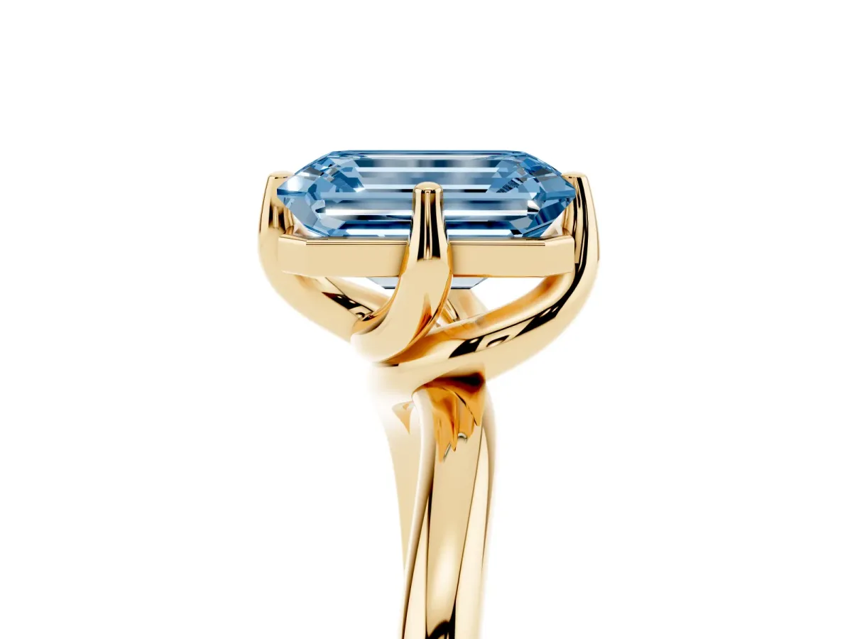 Fancy Blue Emerald Cut Diamond Solitaire Engagement Ring with Four-Prong Setting and Classic Band Yellow gold