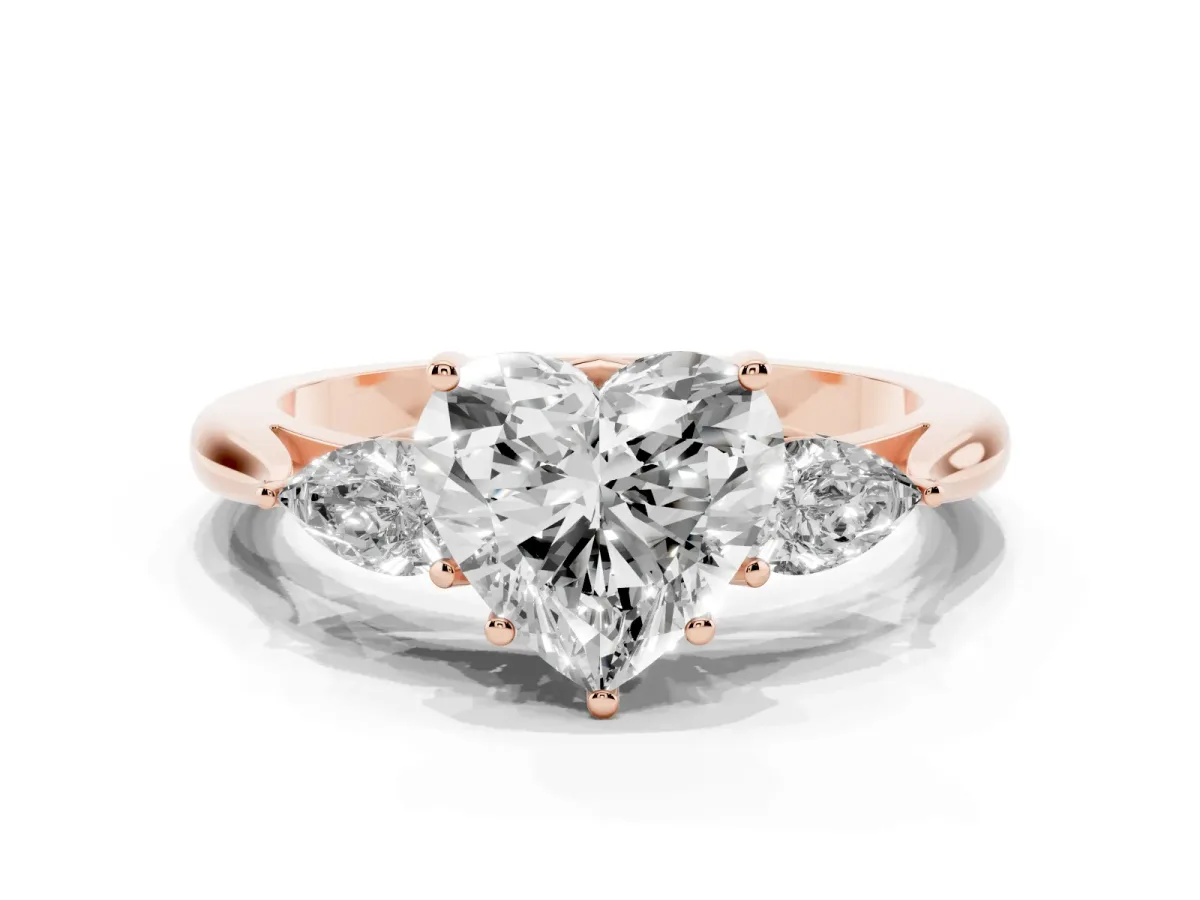 Three-Stone Heart Cut Diamond Ring with Pear Side Stones in Four-Prong Setting Rose gold