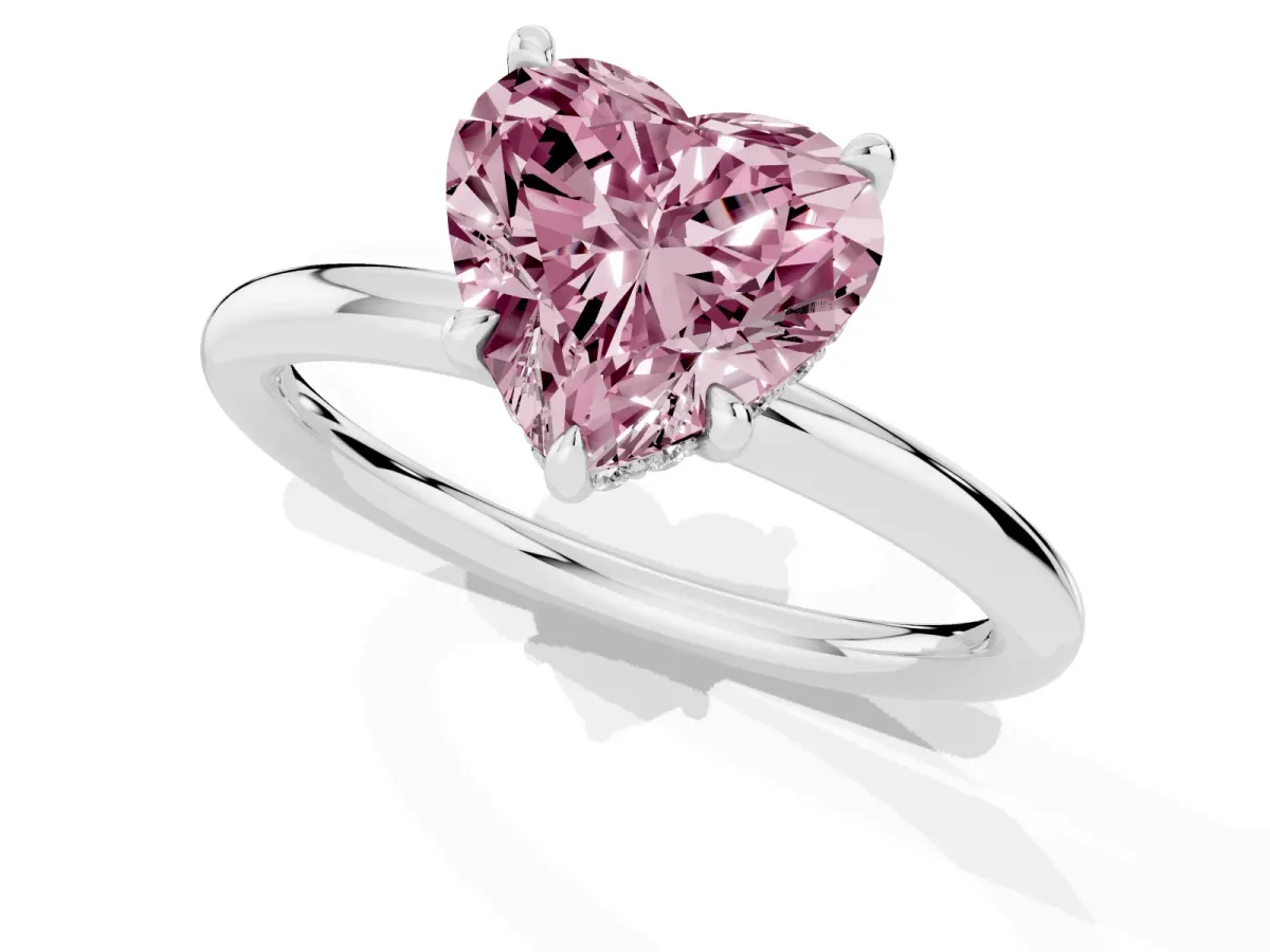 Fancy Pink Heart Cut Diamond Solitaire Ring with Thin Band and Four-Prong Setting Platinum