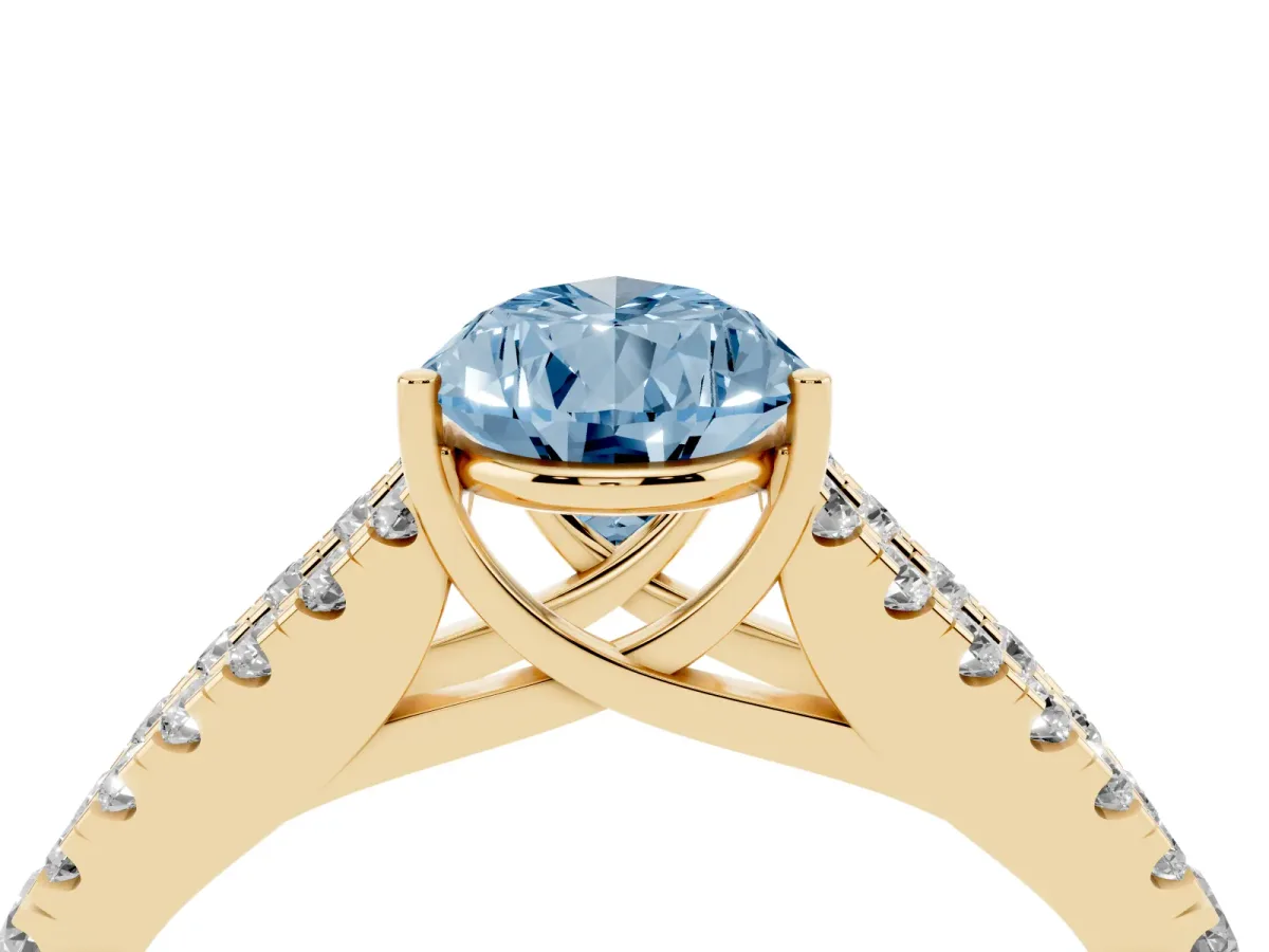 Fancy Blue Pear Cut Diamond Split Shank Pavé Engagement Ring with Four-Prong Setting Yellow gold