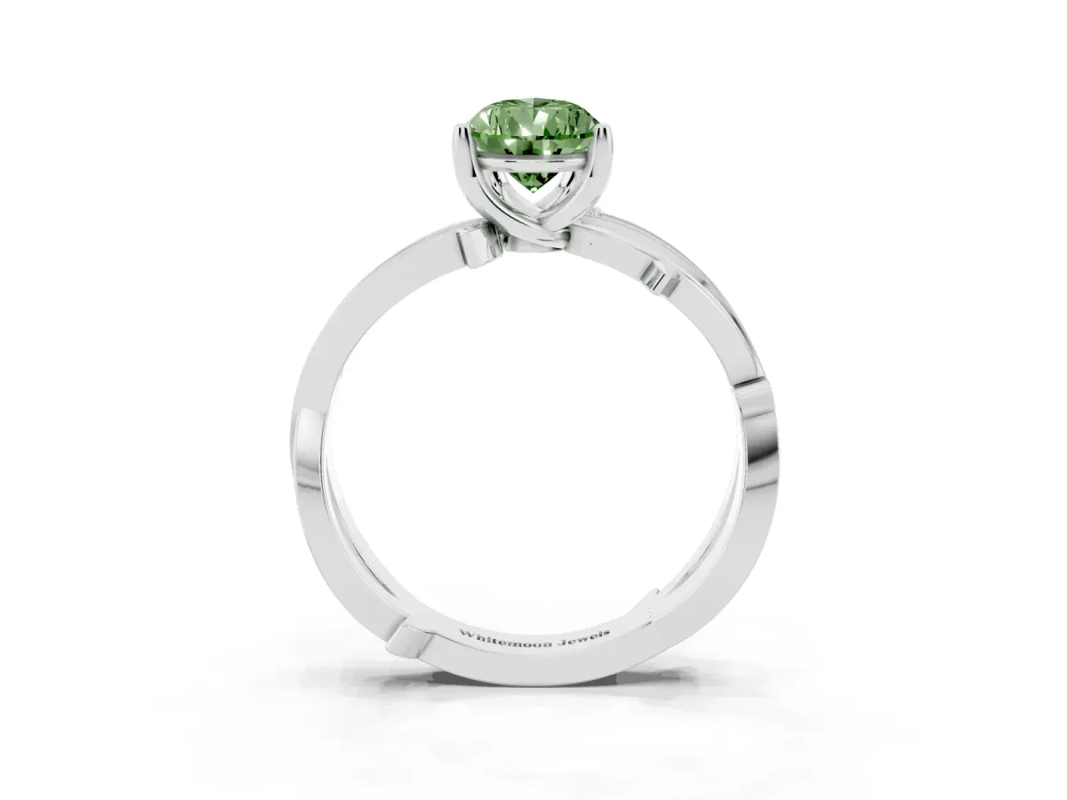 Fancy Green Pear Cut Solitaire Twist Band with Pavé Accents and Four-Prong Setting Silver