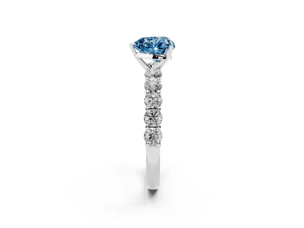 Fancy Blue Heart Cut Diamond Solitaire Ring with Shared Prong Round Side Stones White gold