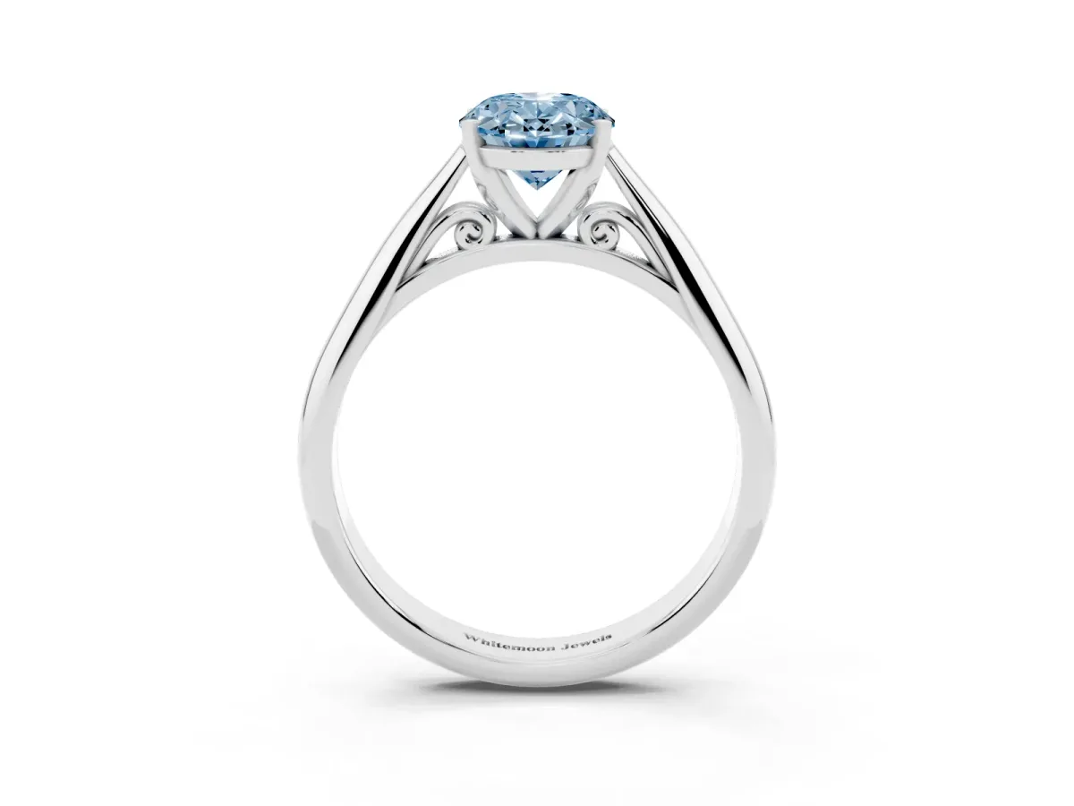 Fancy Blue Oval Cut Diamond Solitaire Engagement Ring with Cathedral Setting and Four-Prong Mount Silver