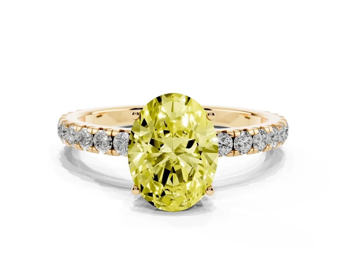 Fancy Yellow Oval Cut Diamond Pavé Solitaire Engagement Ring with Four-Prong Setting Yellow gold