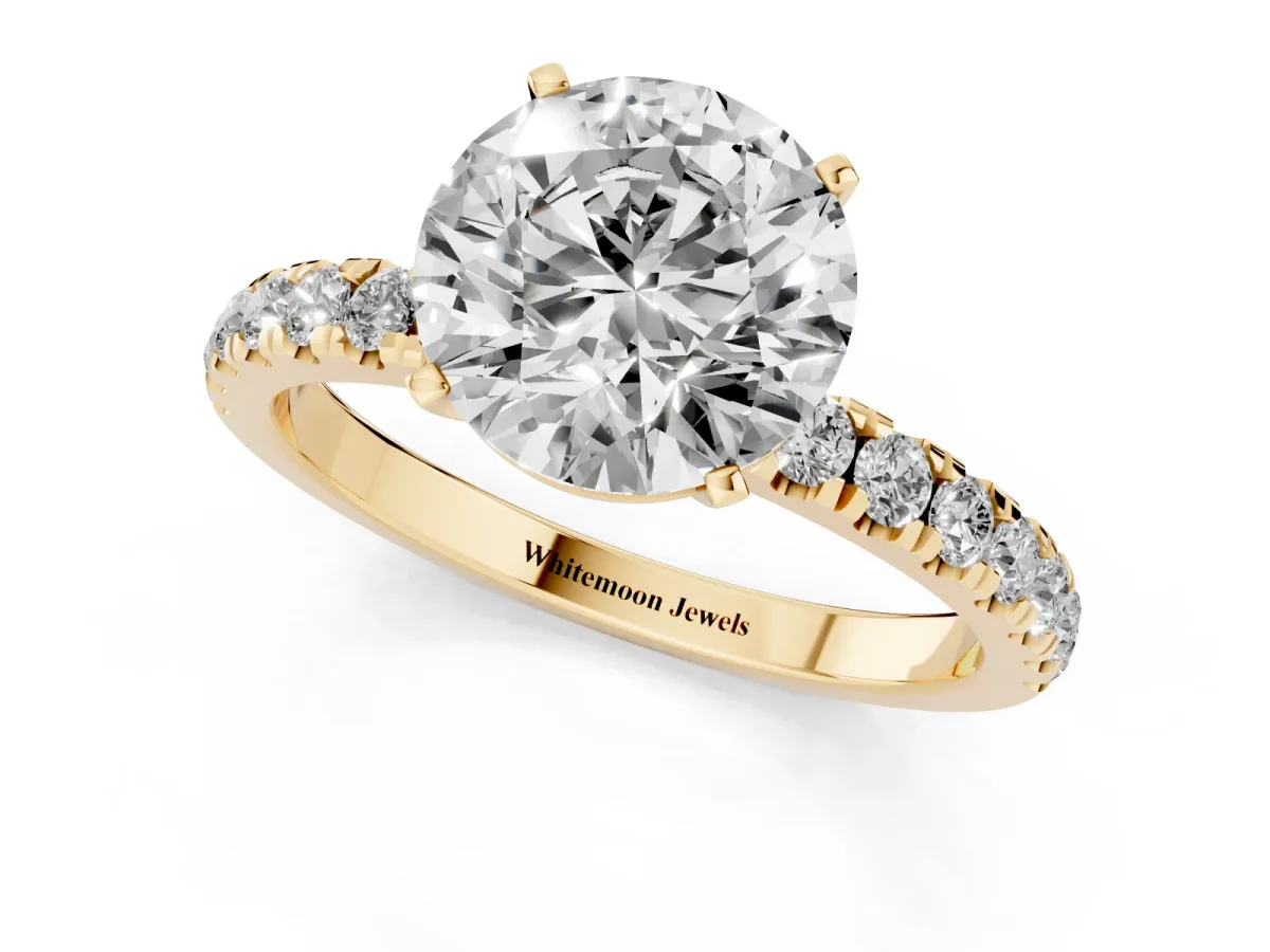 Round Cut Diamond Solitaire Ring with Pavé Accents and Four-Prong Setting Yellow gold