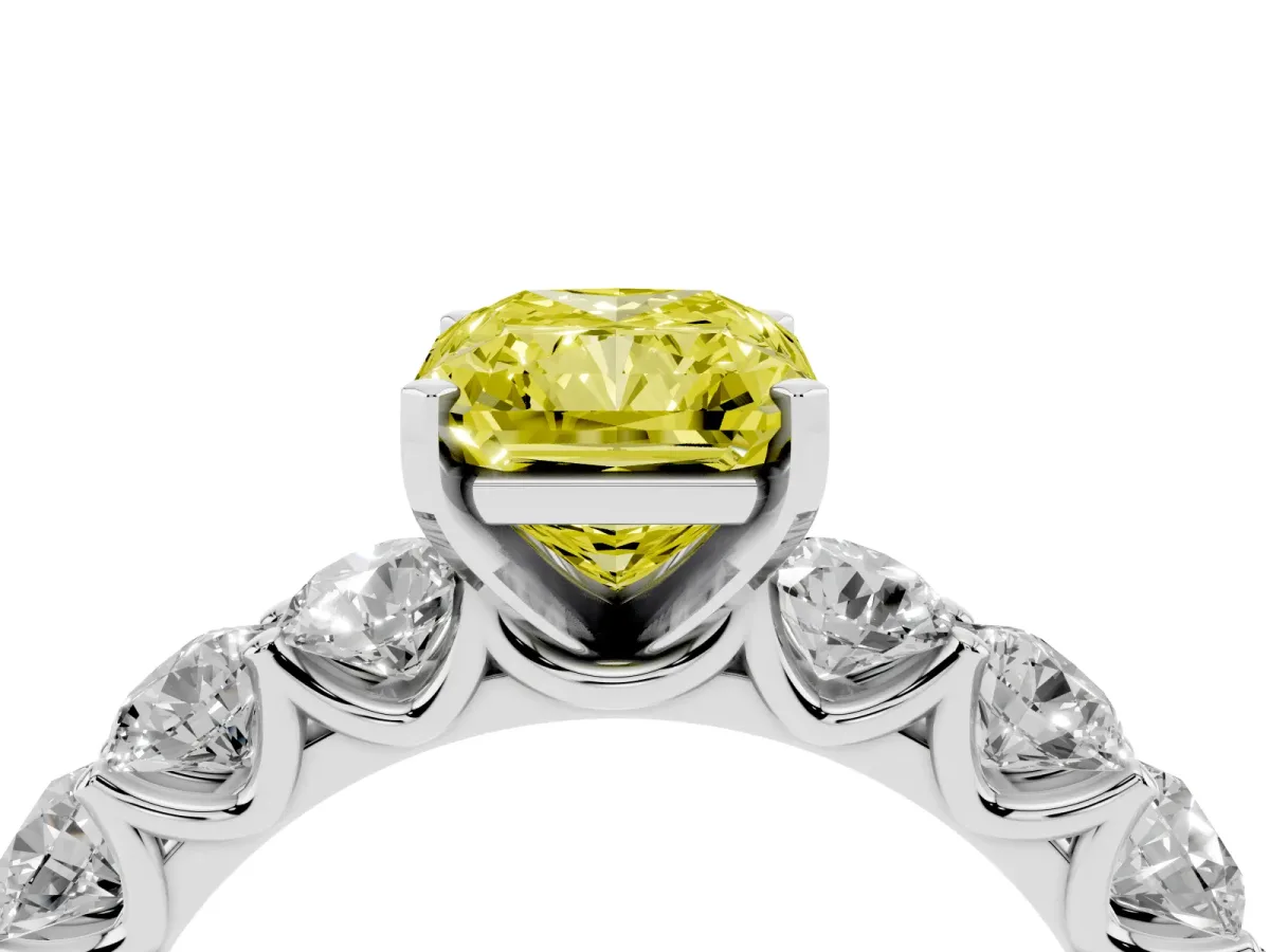 Fancy Yellow Radiant Cut Diamond Prong Setting with Side Stones on a Pave Band Silver
