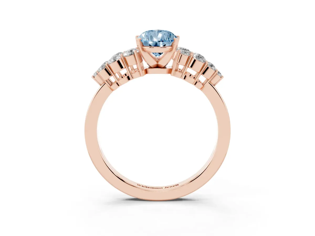 Fancy Blue Pear Cut Cluster Diamond Engagement Ring with Pavé Band and Four-Prong Setting Rose gold