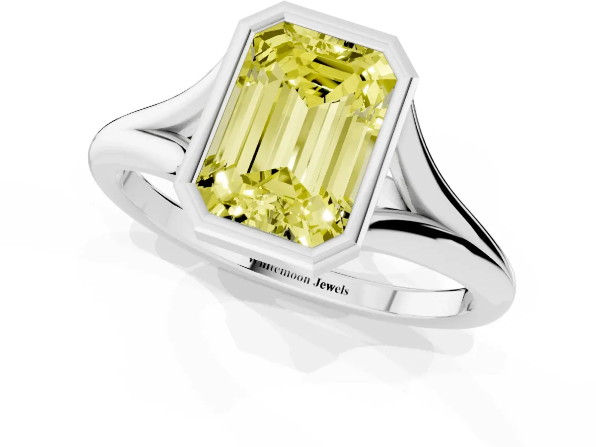 Fancy Yellow Bezel Set Emerald Cut Cut Solitaire Ring with Tapered Band Platinum