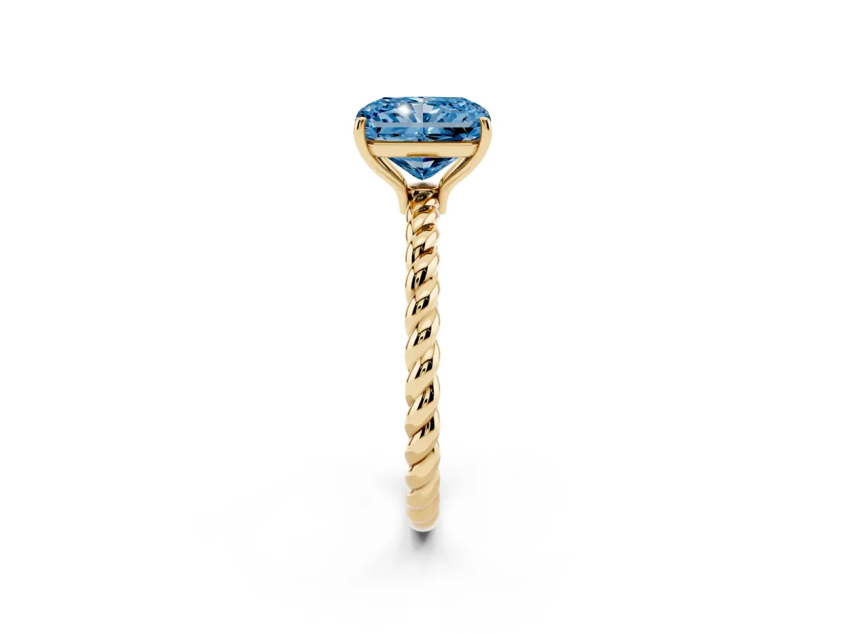 Fancy Blue Radiant Cut Solitaire Twist Band Ring with Four-Prong Setting Yellow gold