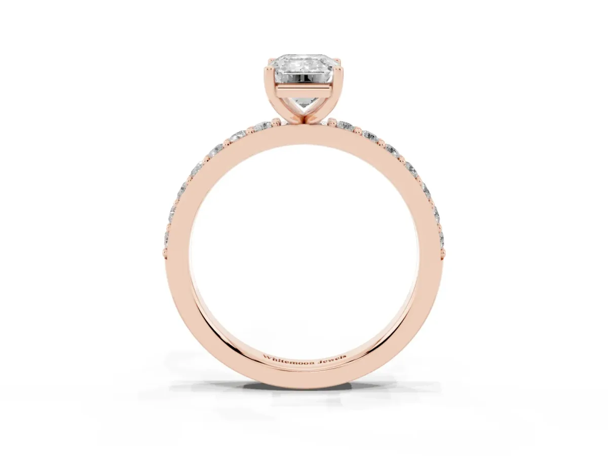 Emerald Cut Cut Diamond Solitaire with Pave Band and Four-Prong Setting Rose gold