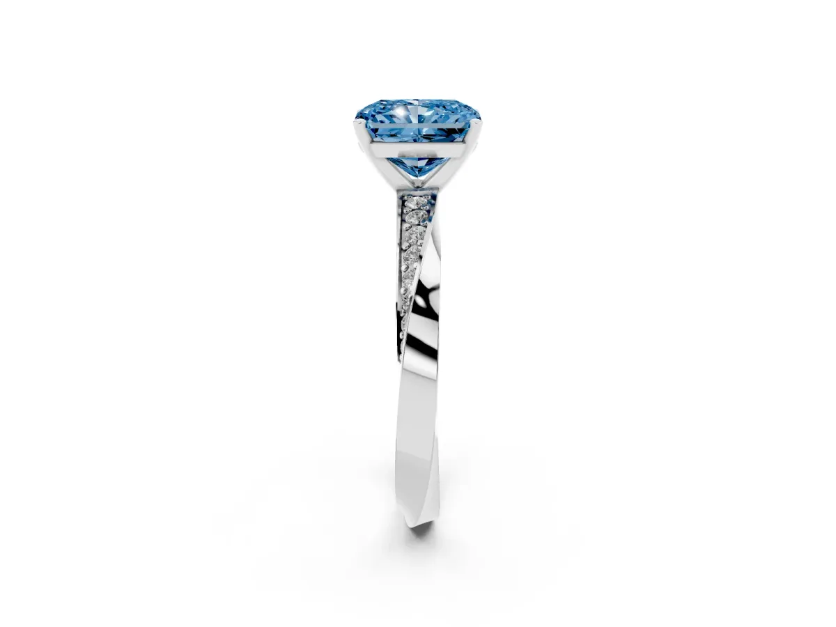 Fancy Blue Radiant Cut Diamond Engagement Ring with Side Stone Accents and Four-Prong Setting Platinum