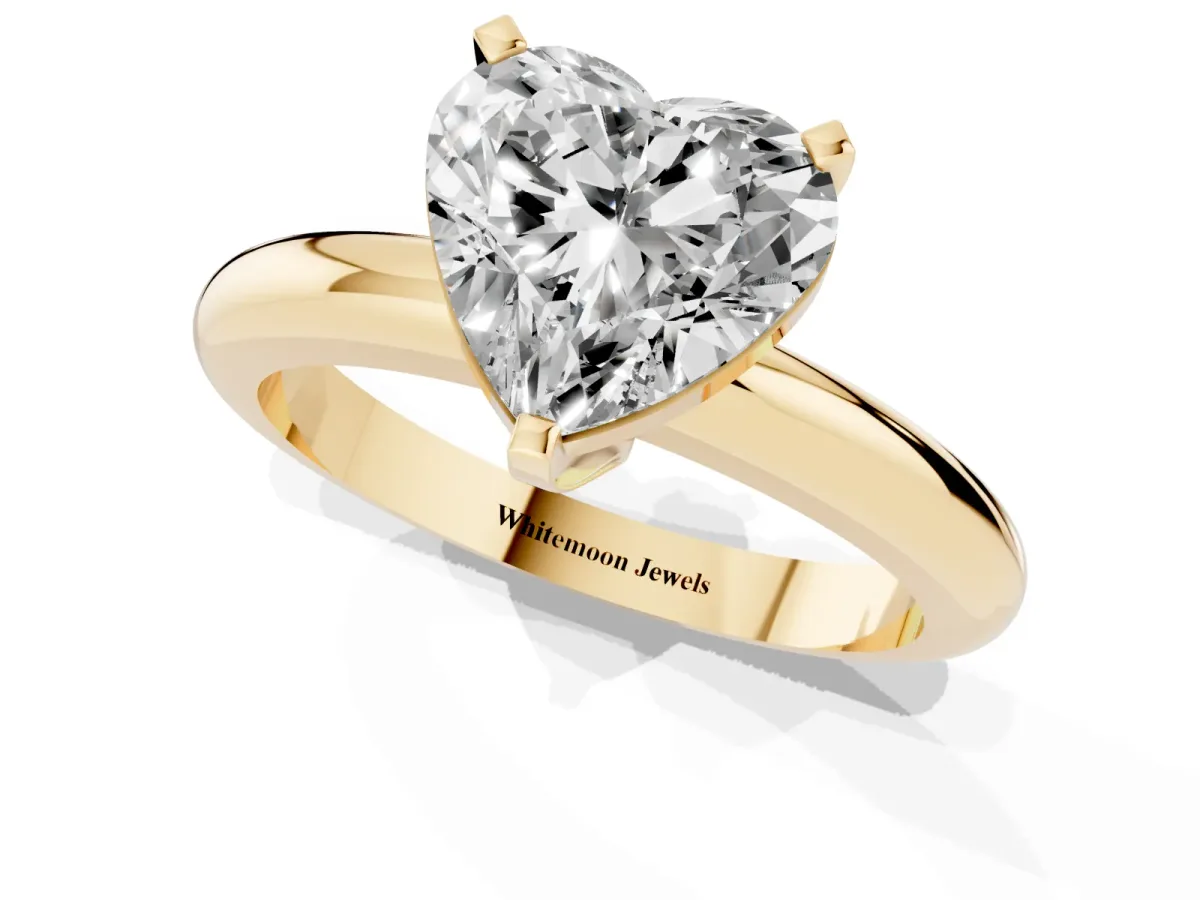 Heart Cut Diamond Solitaire Engagement Ring with Round Band and Four-Prong Setting Yellow gold