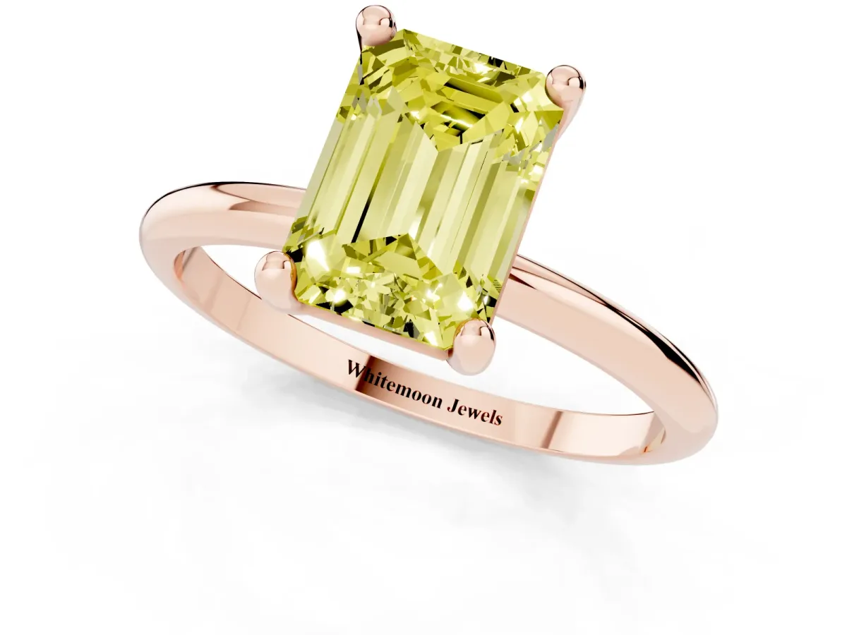 Fancy Yellow Emerald Cut Solitaire Diamond Ring with 4-Prong Setting on a Classic Band Rose gold