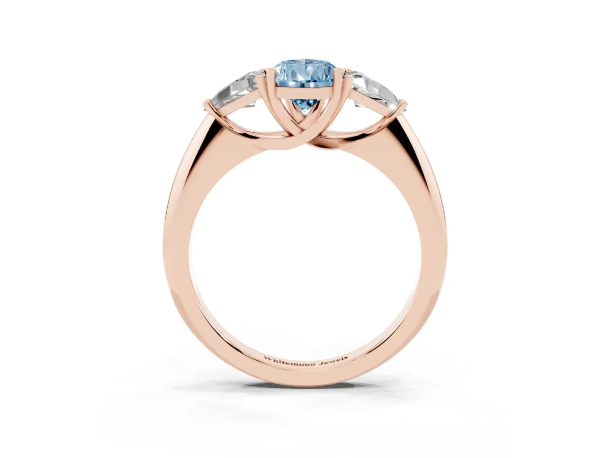 Fancy Blue Three-Stone Pear Cut Diamond Engagement Ring with Trillion Side Stones and Prong Setting Rose gold