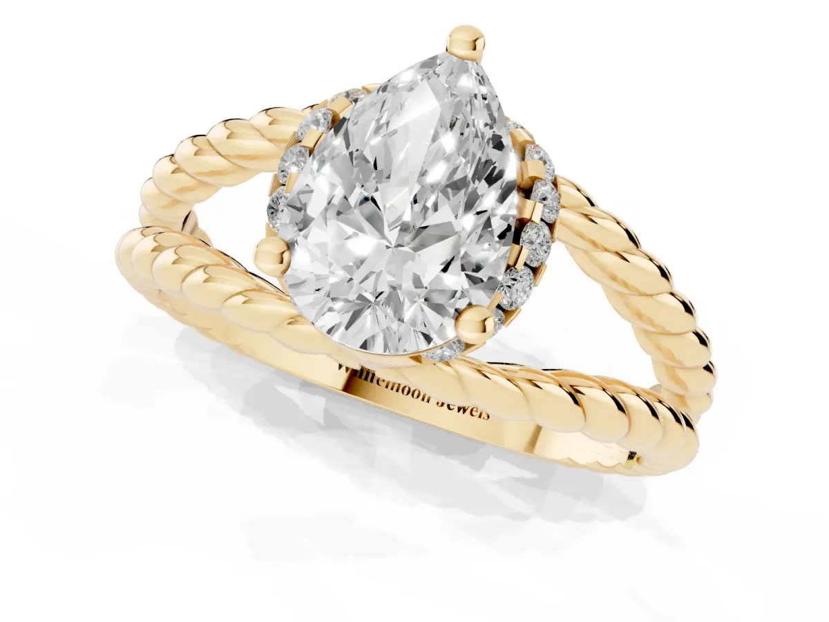 Pear Cut Halo Twisted Band Four-Prong Ring Yellow gold