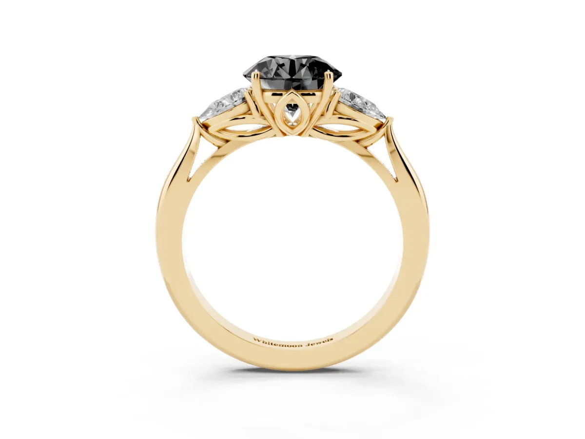 Fancy Black Round Cut Diamond Three-Stone Ring with Pear Side Stones and Prong Setting Yellow gold