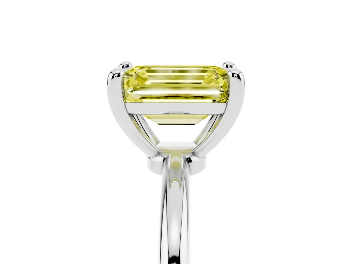 Fancy Yellow Emerald Cut Solitaire Diamond Ring with 4-Prong Setting on a Classic Band White gold