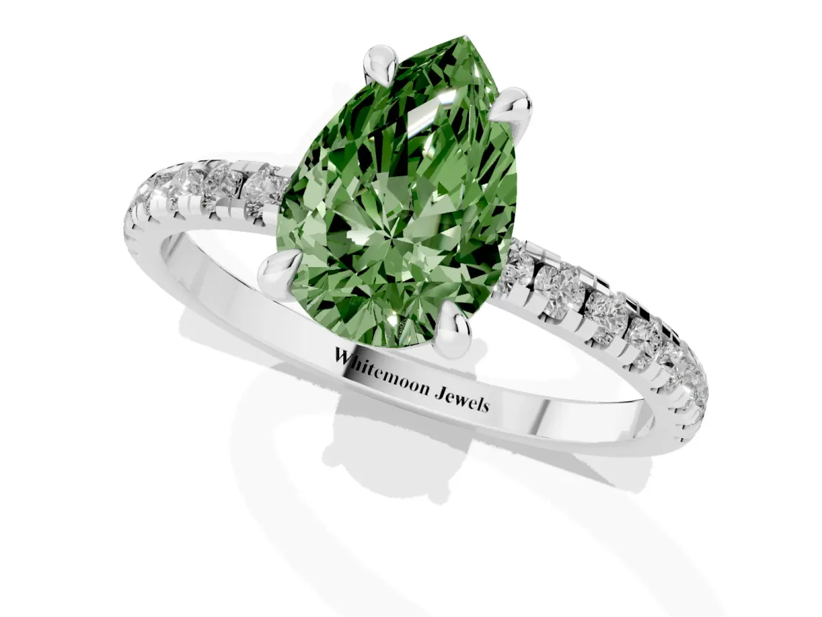 Fancy Green Pear Cut Diamond Brilliant Solitaire Ring with Pavé Band and Four-Prong Setting White gold