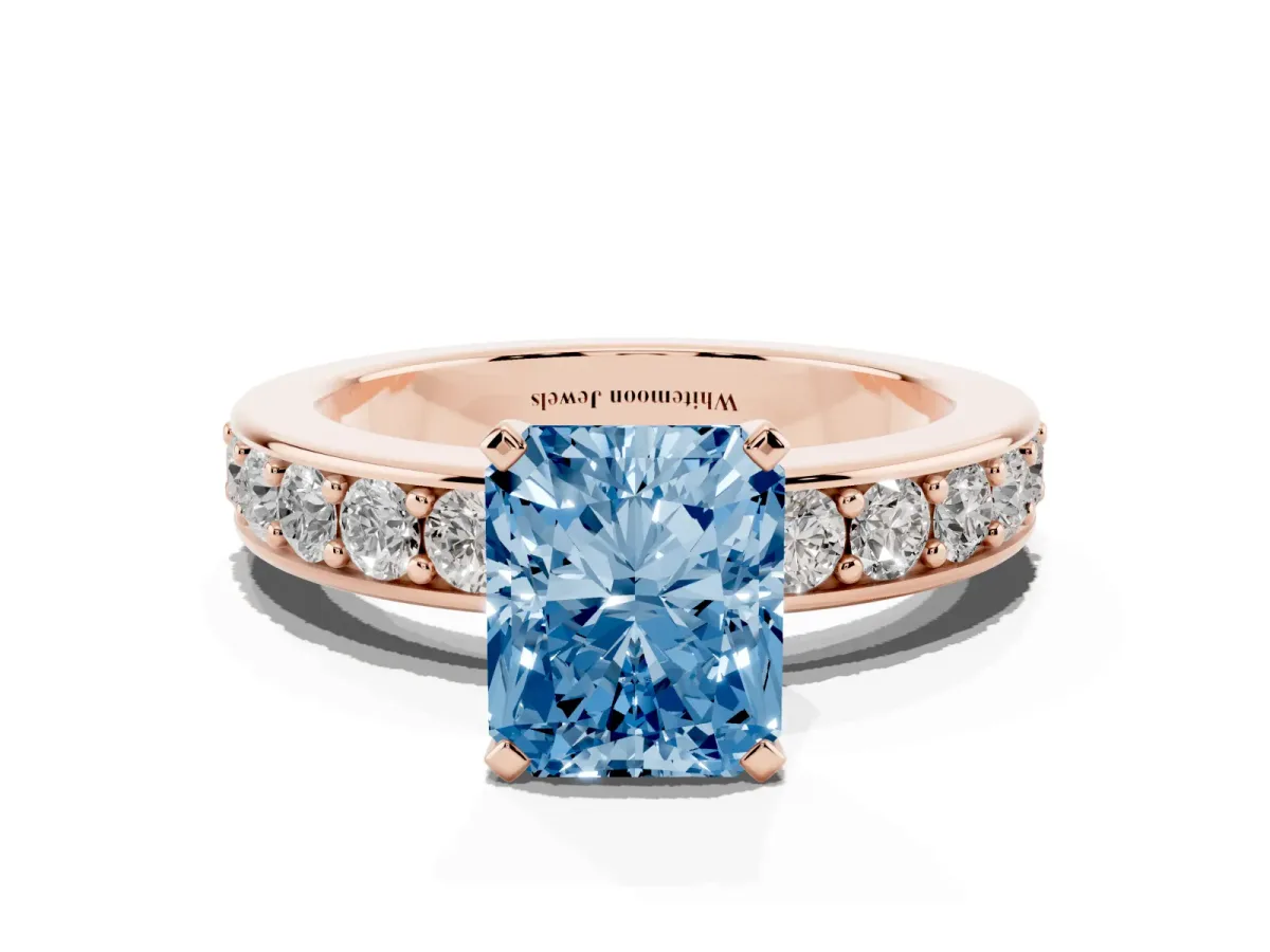 Fancy Blue Radiant Cut Diamond Engagement Ring with Channel Set Round Band and Prong Setting Rose gold