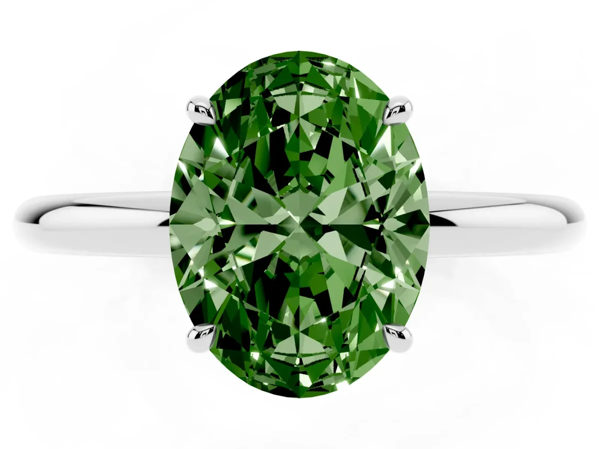 Fancy Green Oval Cut Diamond Solitaire Ring with Thin Band and Four-Prong Setting Silver