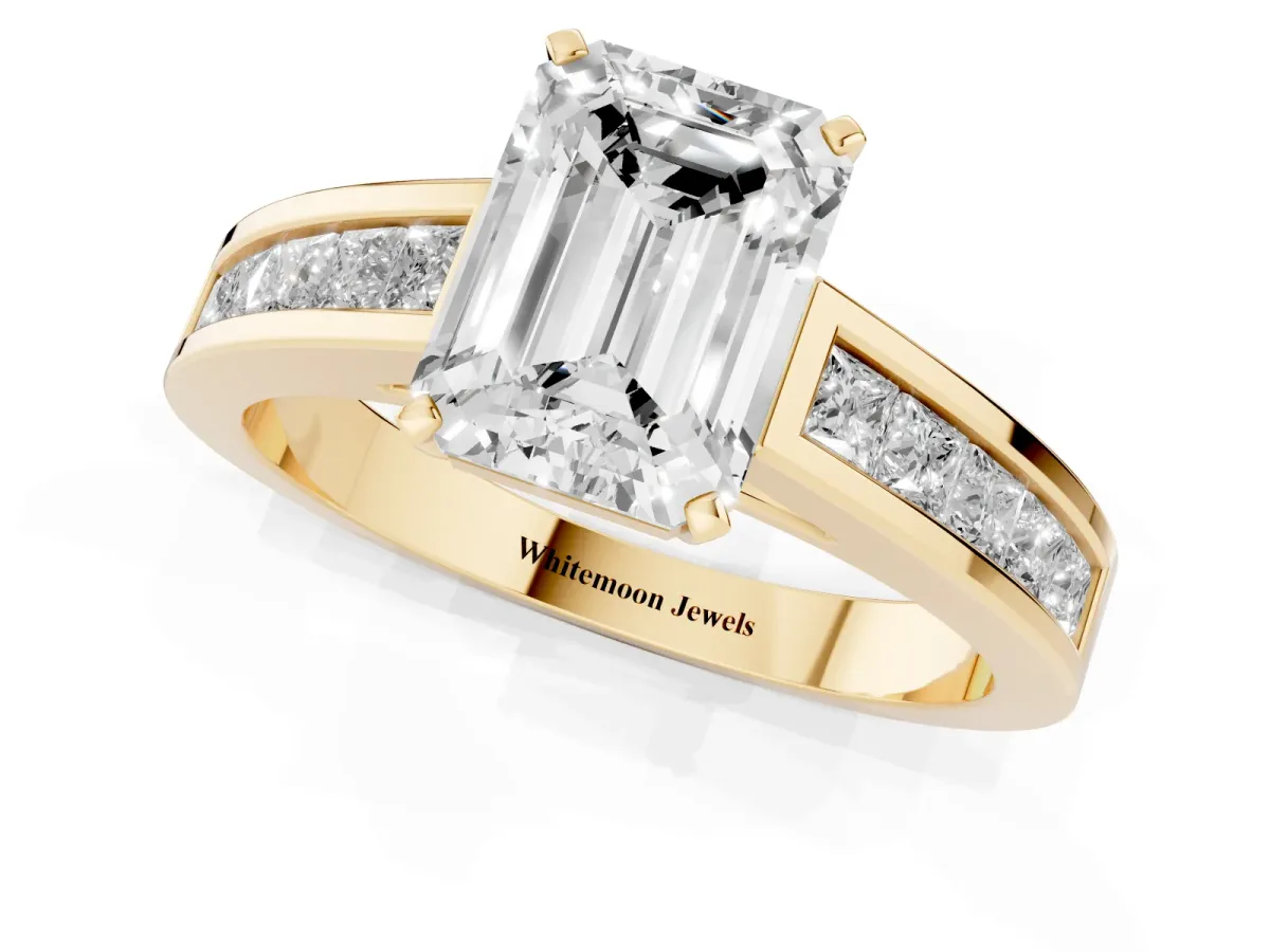 Emerald Cut Solitaire Diamond Ring with Channel-Set Band and Four-Prong Setting Yellow gold