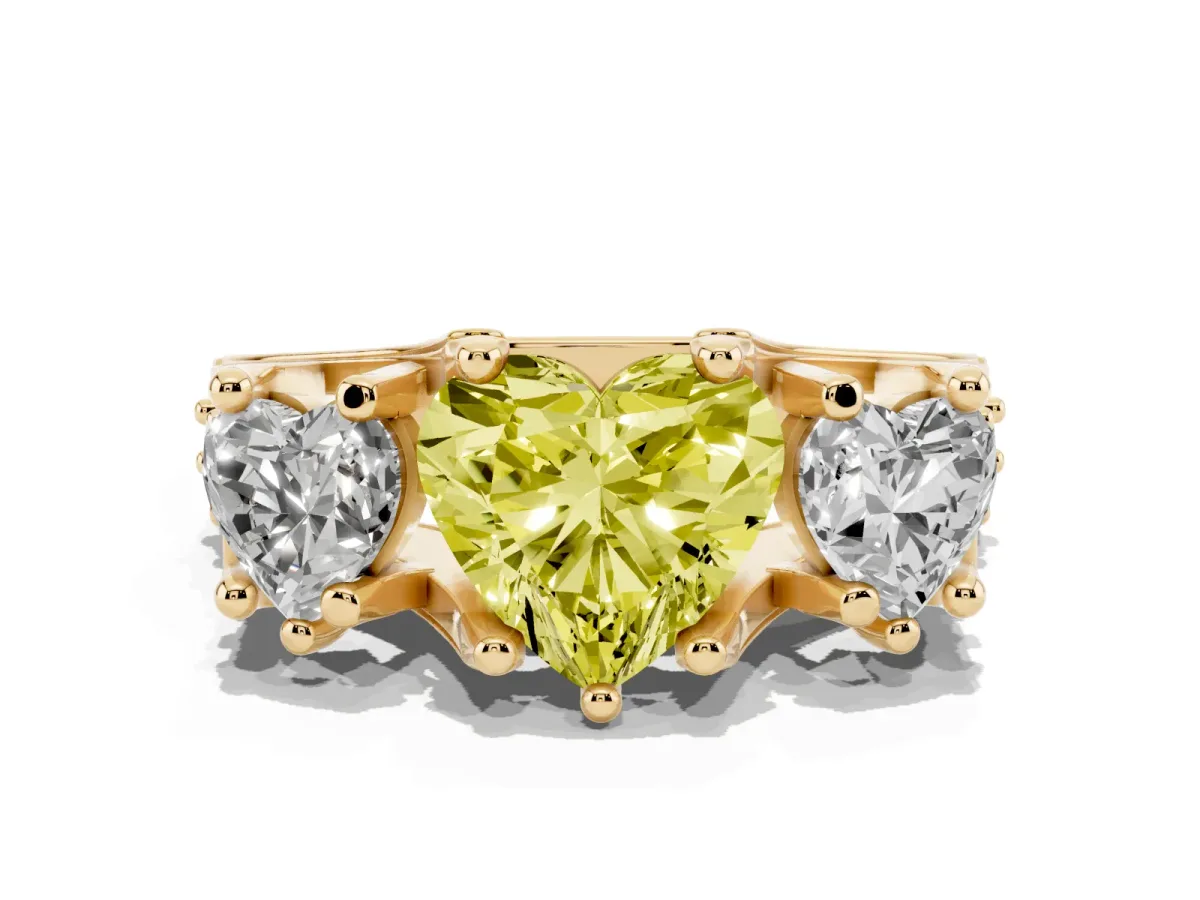 Fancy Yellow Heart Cut Diamond Three-Stone Ring with Channel Set Band and Four-Prong Setting Yellow gold