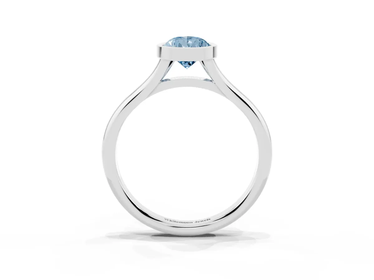 Fancy Blue Bezel Set Pear Cut Cut Solitaire Ring with Tapered Band Platinum