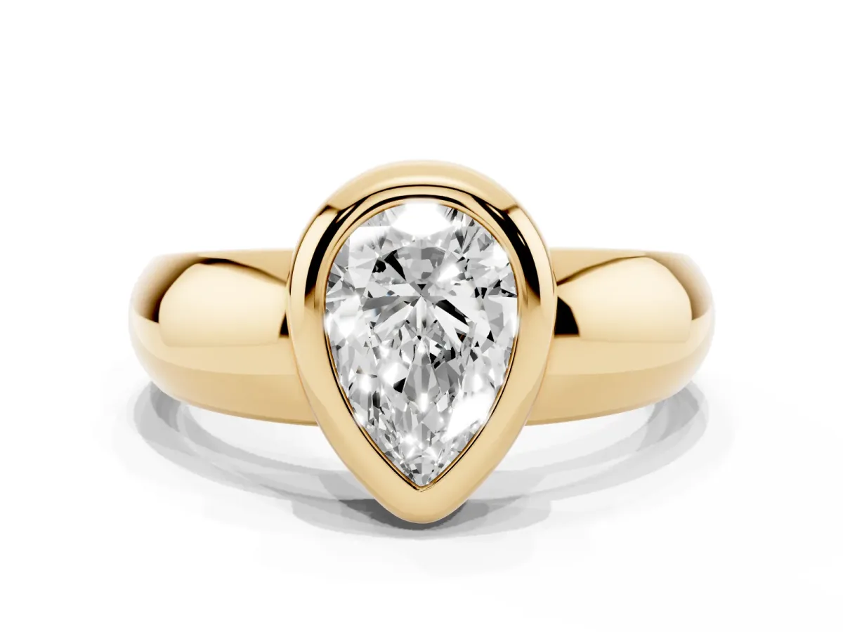 Bezel Set Pear Cut Solitaire Ring with Wide Band Yellow gold