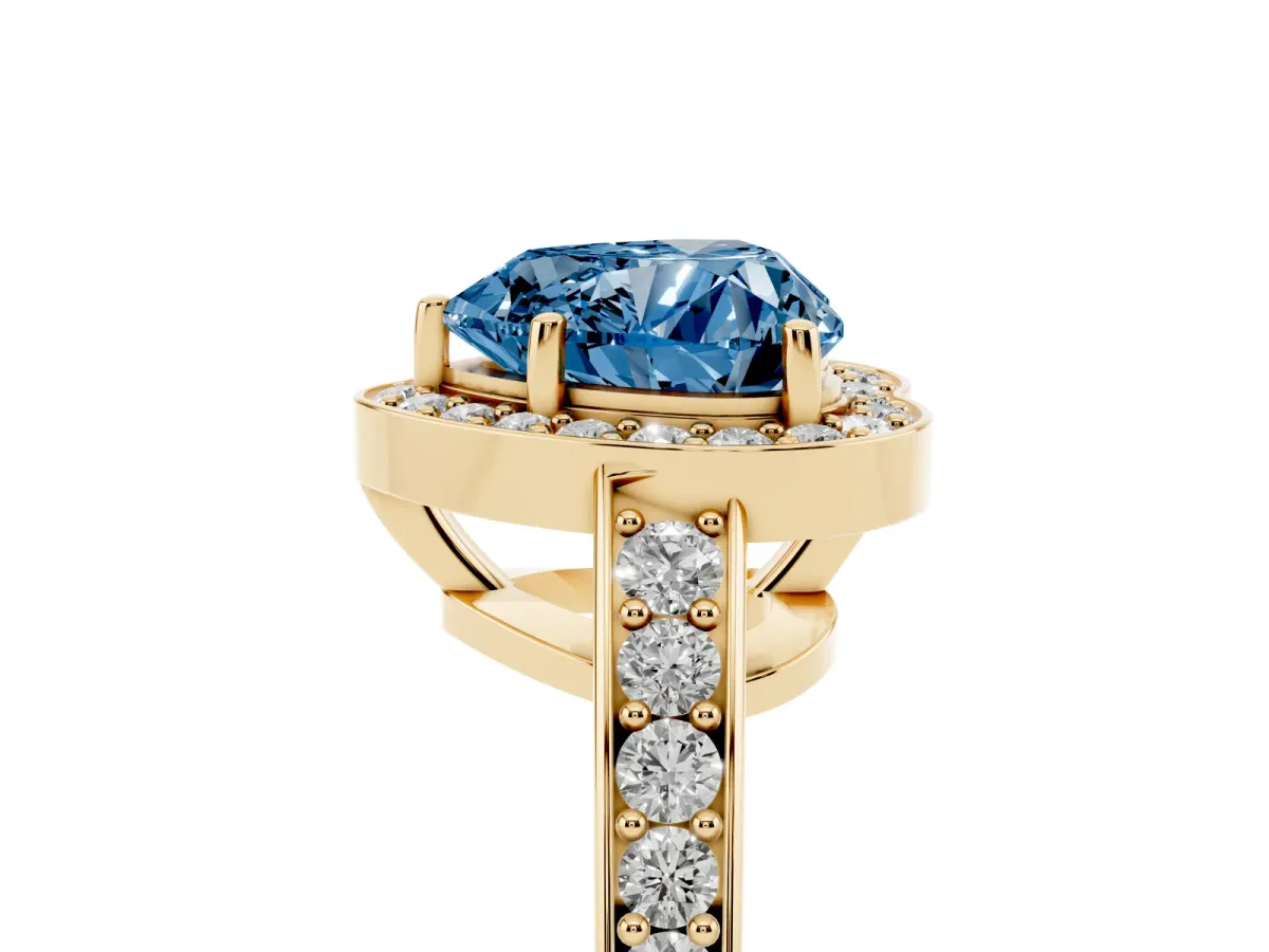 Fancy Blue Heart Cut Halo Pavé Diamond Engagement Ring with Bezel Setting Yellow gold