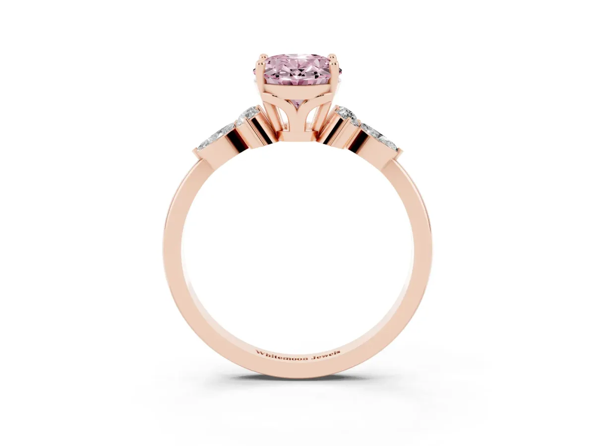 Fancy Pink Oval Cut Brilliant Diamond Solitaire Ring with Pear Side Stones and Four-Prong Setting Rose gold