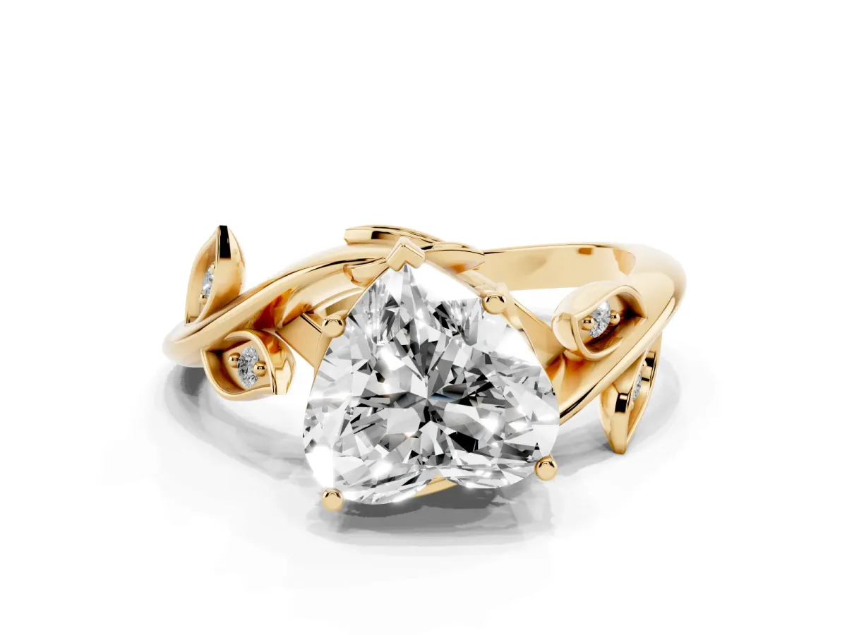 Heart Cut Solitaire Twist Engagement Ring with Leaf Accents and Prong Setting Yellow gold