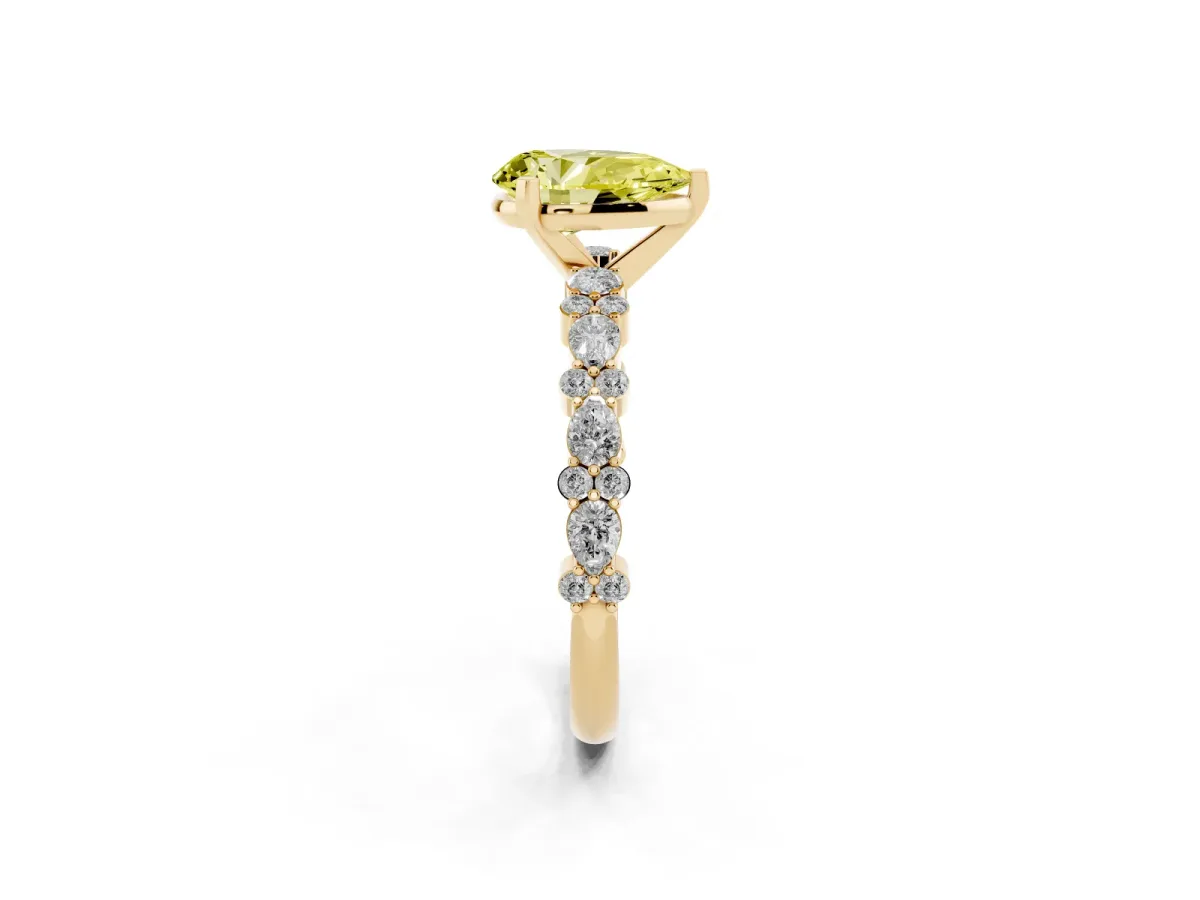 Fancy Yellow Pear Cut Diamond Side Stone Solitaire Ring with Round and Four-Prong Setting Yellow gold