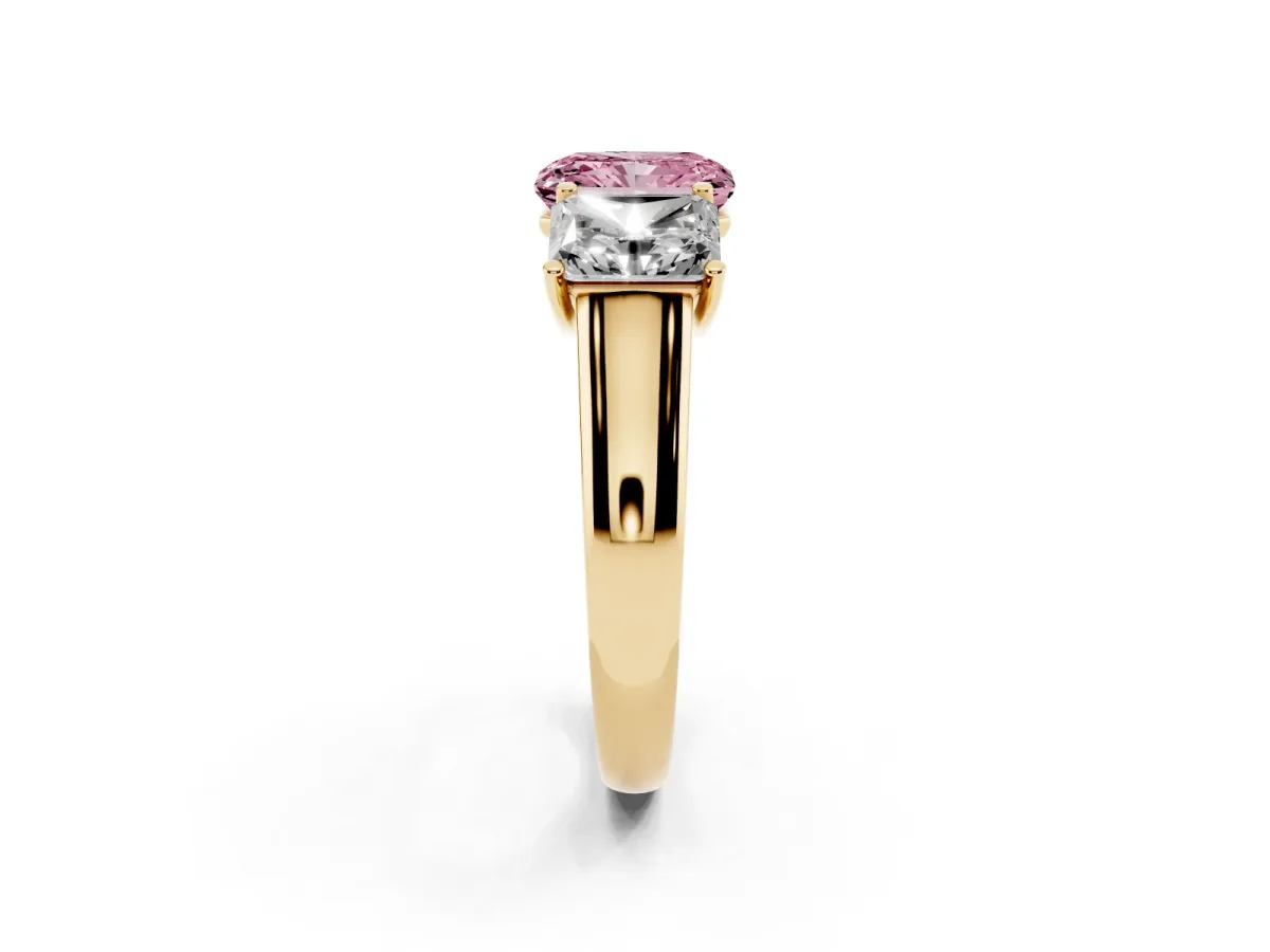 Fancy Pink Radiant Cut Three-Stone Diamond Ring with Prong Setting on a Classic Band Yellow gold