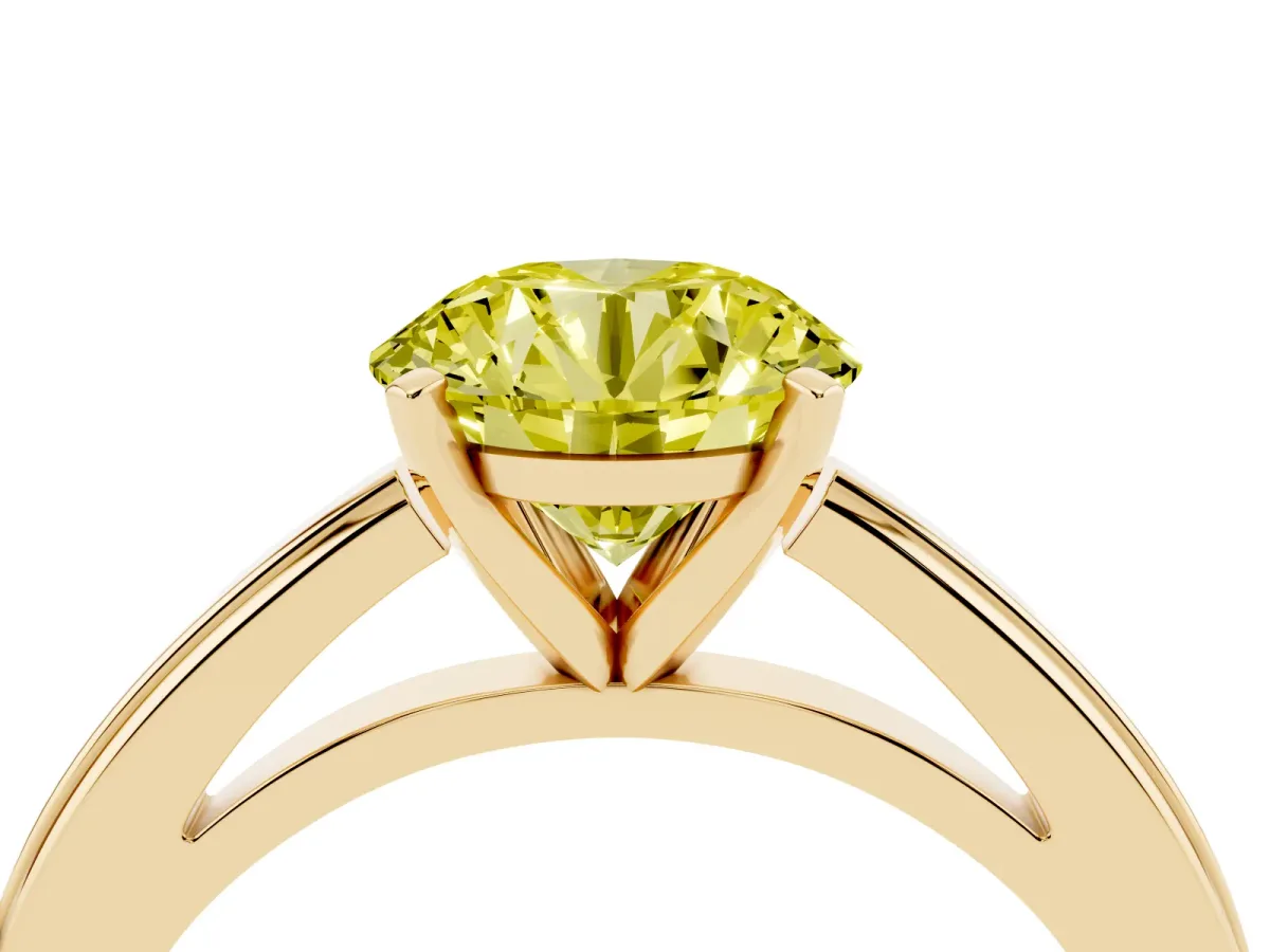 Fancy Yellow Round Cut Solitaire Diamond Ring with Four-Prong Setting and Classic Band Yellow gold