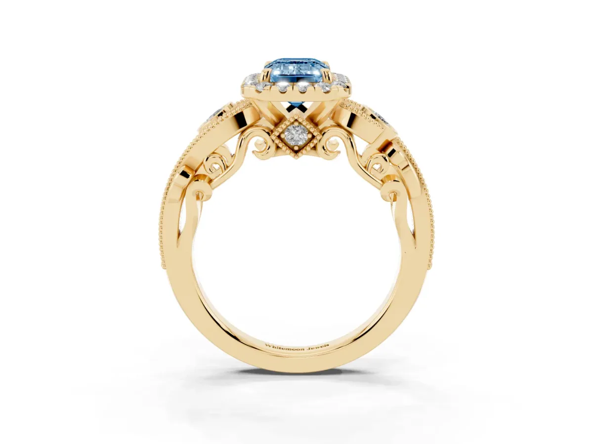 Fancy Blue Emerald Cut Diamond Halo Ring with Milgrain Pavé Band and Four-Prong Setting Yellow gold