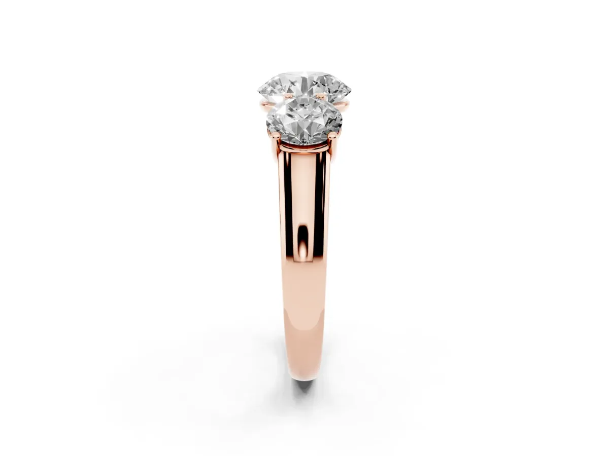 Round Cut Three-Stone Diamond Ring with Prong Setting on a Classic Band Rose gold