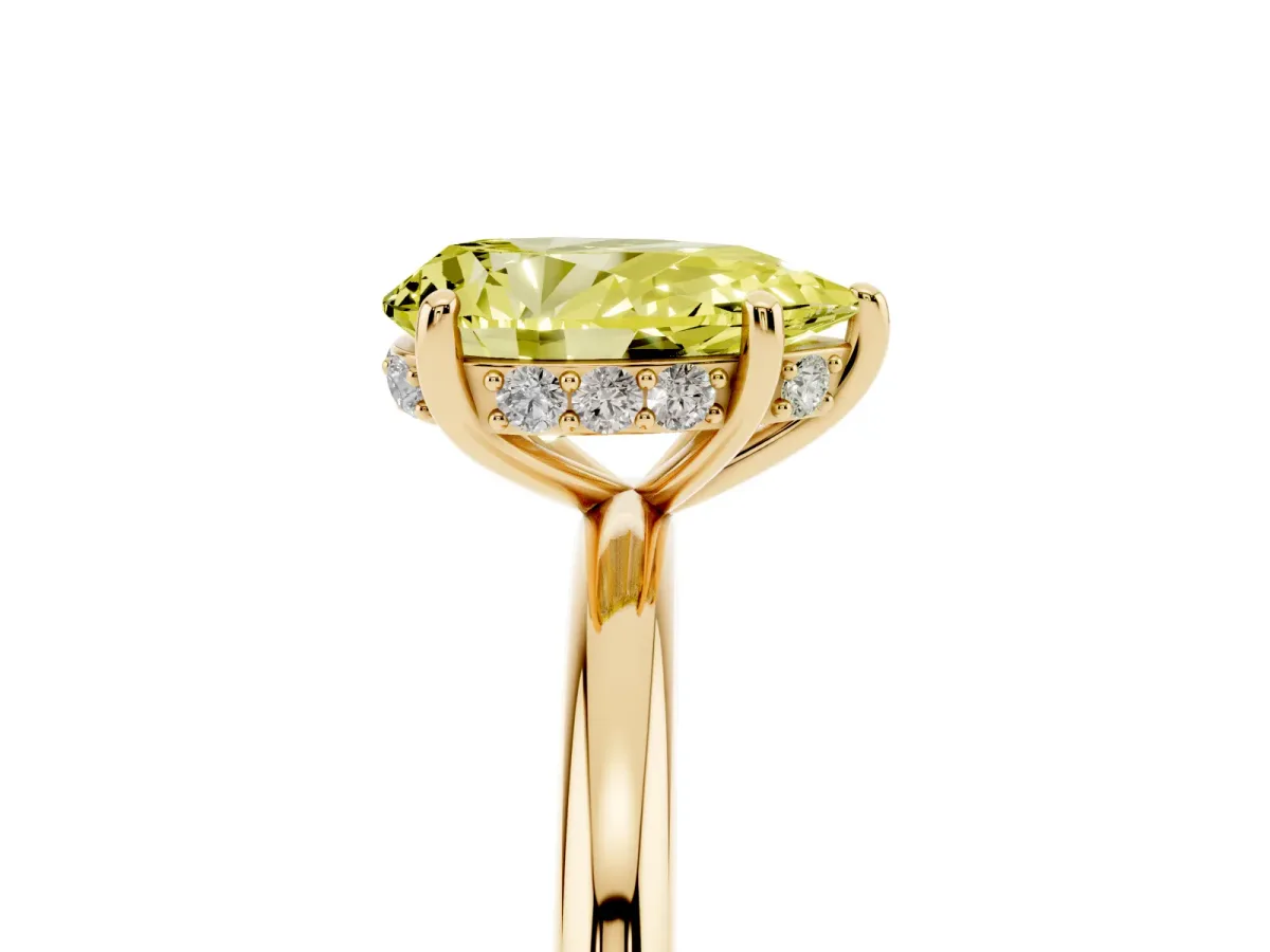 Fancy Yellow Pear Cut Solitaire Diamond Ring with a Classic Band and Four-Prong Setting Yellow gold