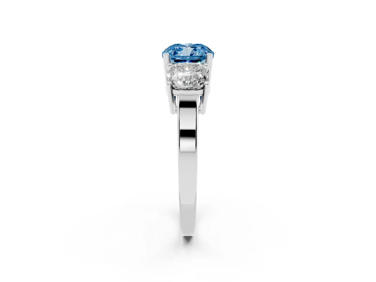 Fancy Blue Three-Stone Cushion Cut Cut Diamond Engagement Ring with Flat Band and Four-Prong Setting Silver