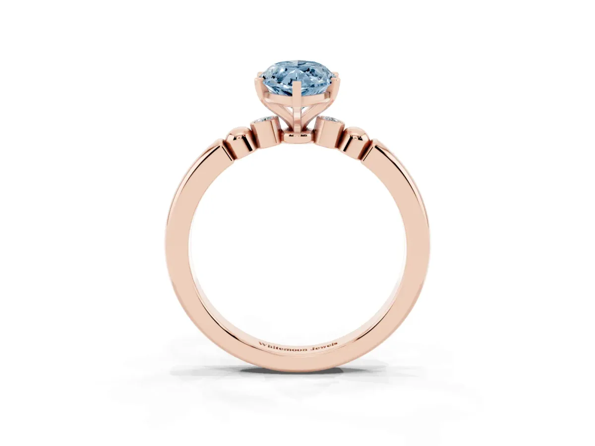 Fancy Blue Marquise Cut Solitaire Beaded Band with Four-Prong Setting Rose gold