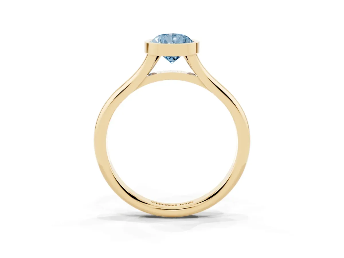 Fancy Blue Bezel Set Pear Cut Cut Solitaire Ring with Tapered Band Yellow gold