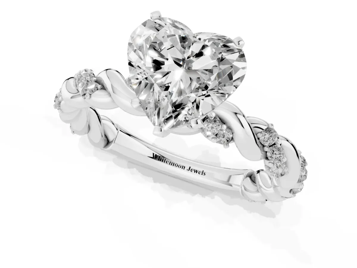 Heart Cut Diamond Solitaire Ring with Twisted Band and Pavé Accents Silver