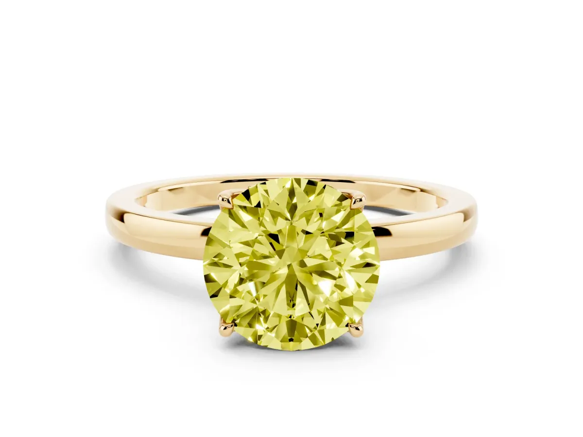 Fancy Yellow Round Cut Diamond Solitaire Ring with Thin Band and Prong Setting Yellow gold