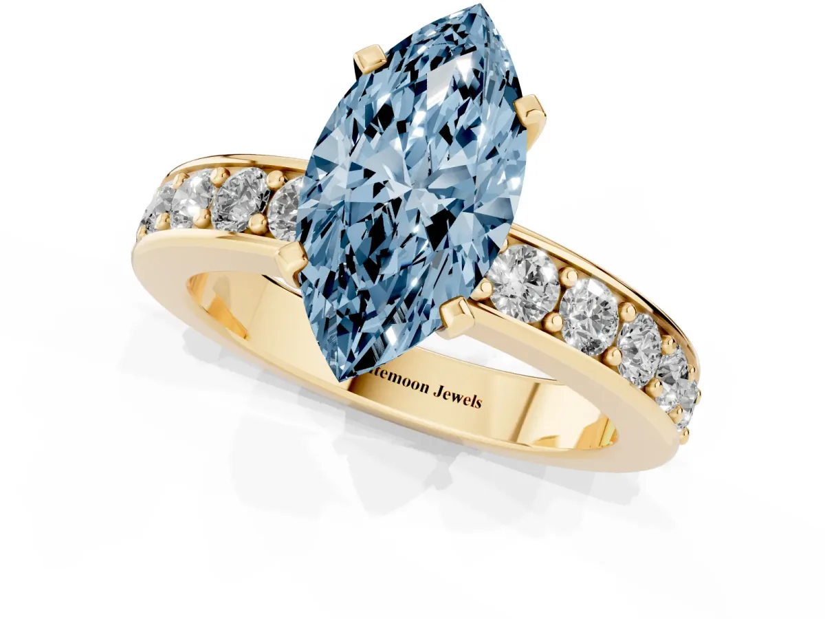 Fancy Blue Marquise Cut Diamond Engagement Ring with Channel Set Round Band and Prong Setting Yellow gold