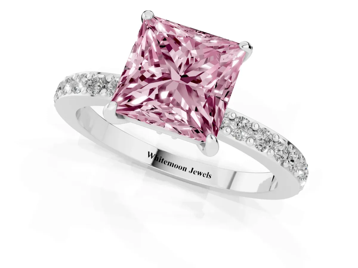 Fancy Pink Princess Cut Diamond Pavé Engagement Ring with Round Accents and Prong Setting Platinum