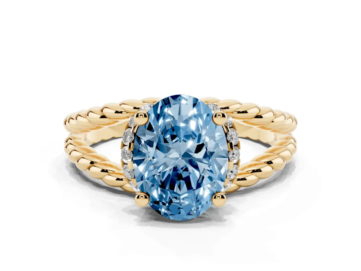 Fancy Blue Oval Cut Halo Twisted Band Four-Prong Ring Yellow gold