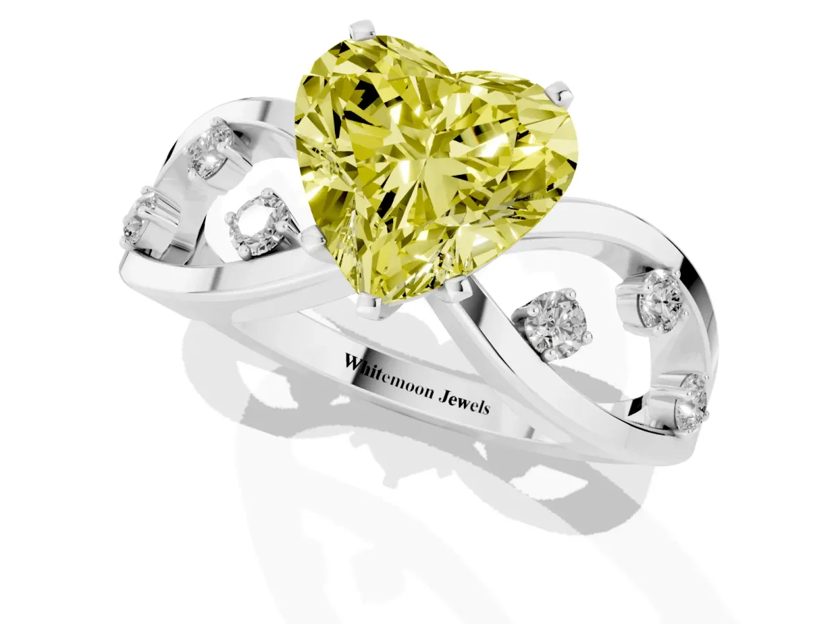 Fancy Yellow Heart Cut Cut Solitaire Diamond with Side Stones on Criss-Cross Band and Four-Prong Setting Silver